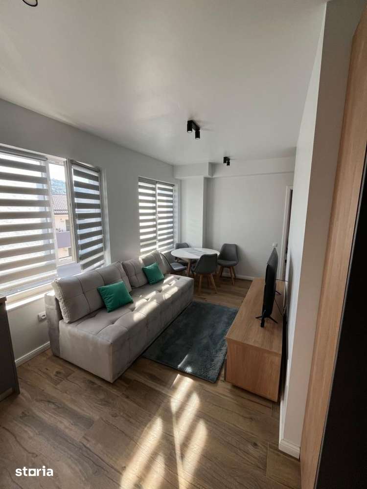 Apartament modern de inchiriat, 2 camere cu terasa si parcare subteran — fotografia 1