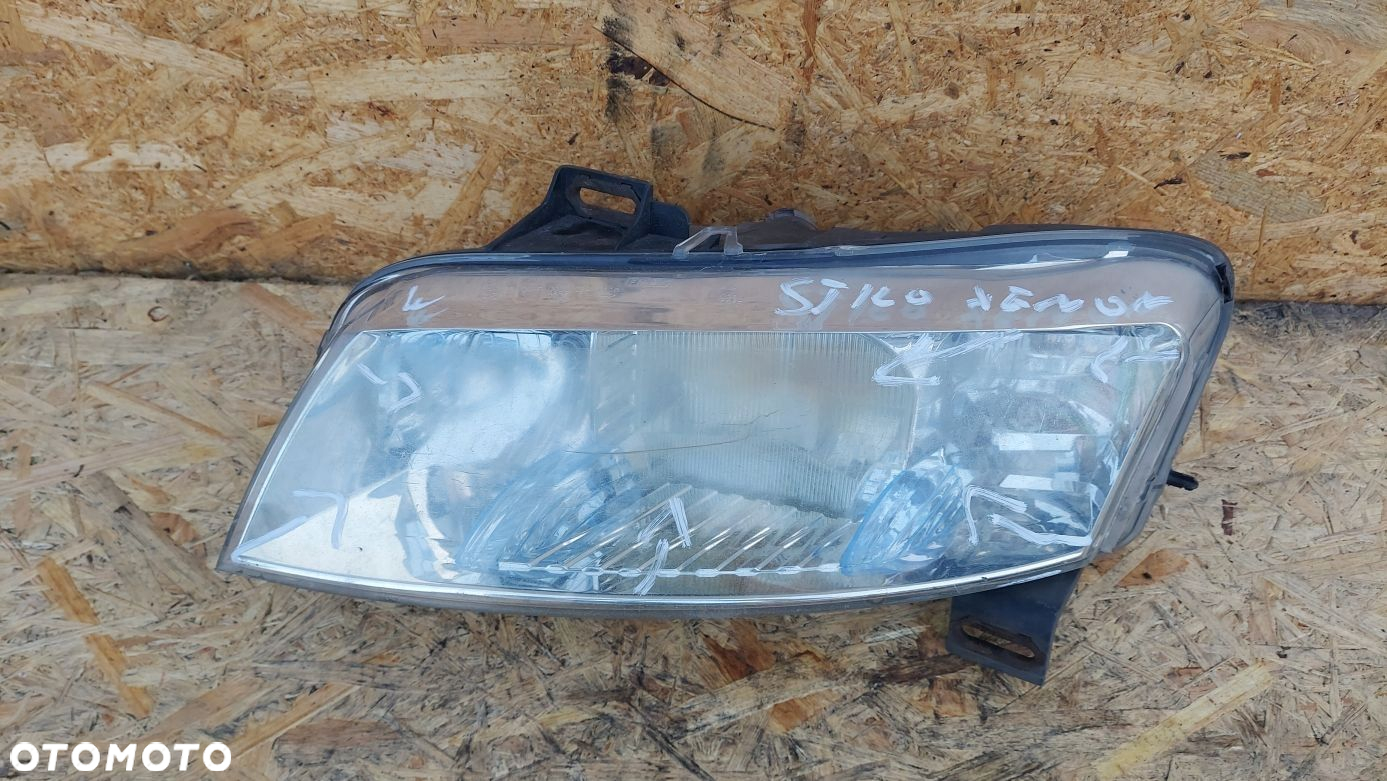 LAMPA REFLEKTOR LEWY XENON LEWA FIAT STILO 3D - 3