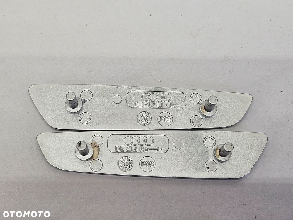 AUDI Q7 4L 05-15R ZNACZEK LOGO EMBLEMAT AUDI EXCLUSIVE PRAWY LEWY - 4