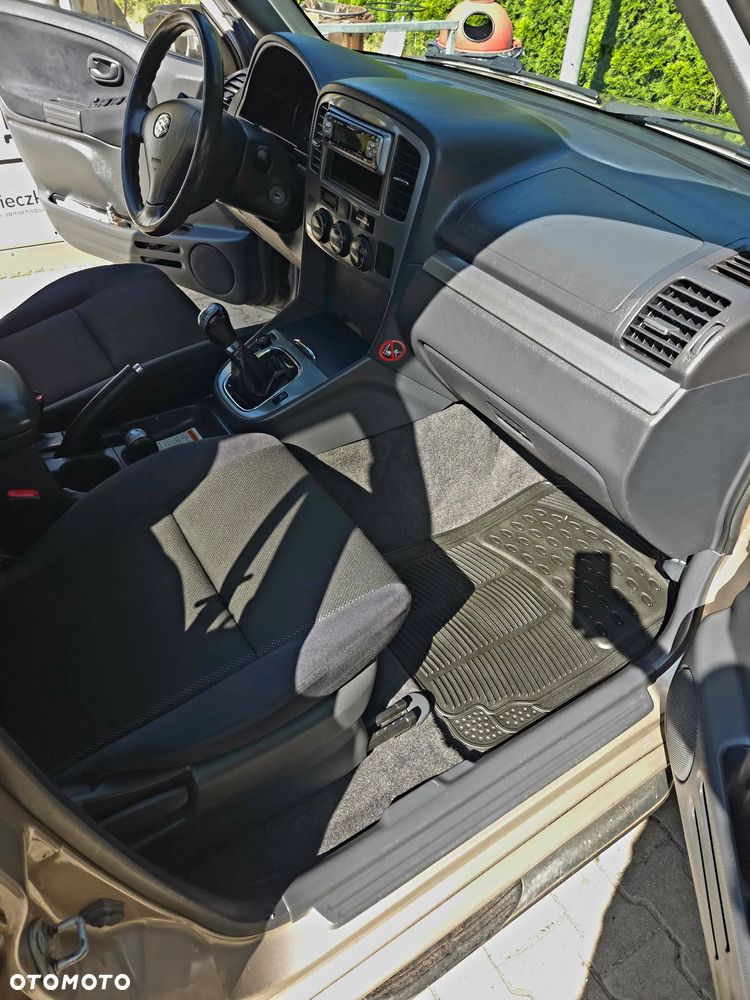 Suzuki Grand Vitara 2.0 - 12