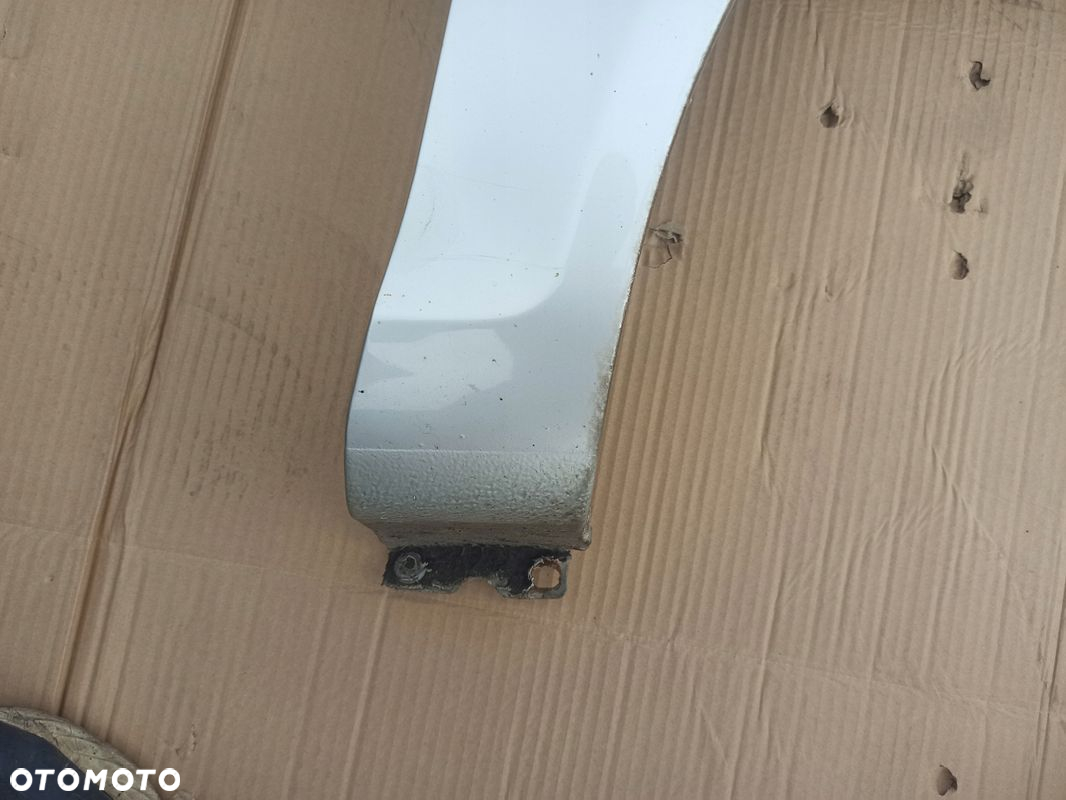 Błotnik prawy przód OPEL CORSA D Z157 06-11 - 2