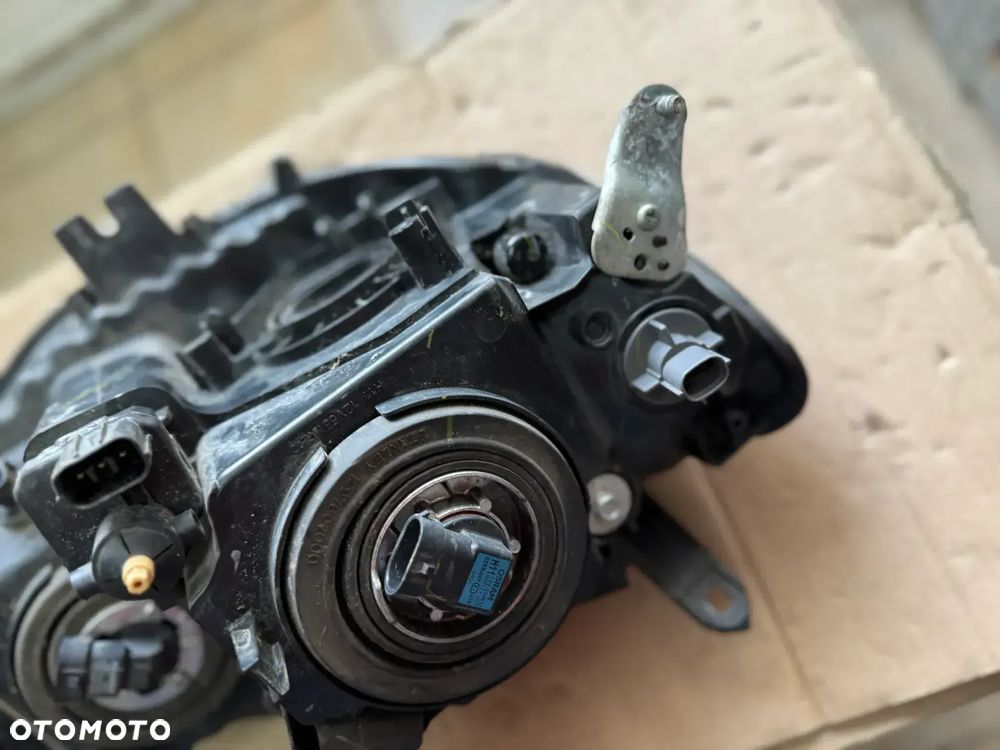 Reflektor / lampa przód przednia lewa Mitsubishi L200 - oryginalna - 4