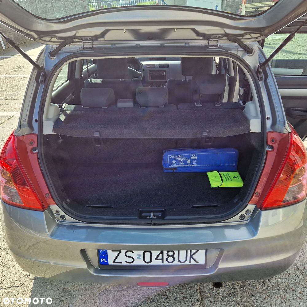 Suzuki Swift 1.3 Club - 12