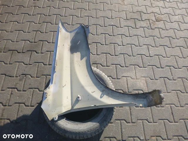 BŁOTNIK LEWY PRZÓD LEWY PRZEDNI CHEVROLET AVEO II T250 07-11 - 9