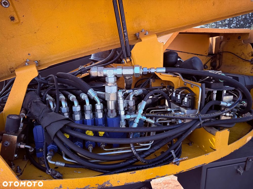 Mecalac 12MTX /2006/ Komplet Łyżek 6szt - 24