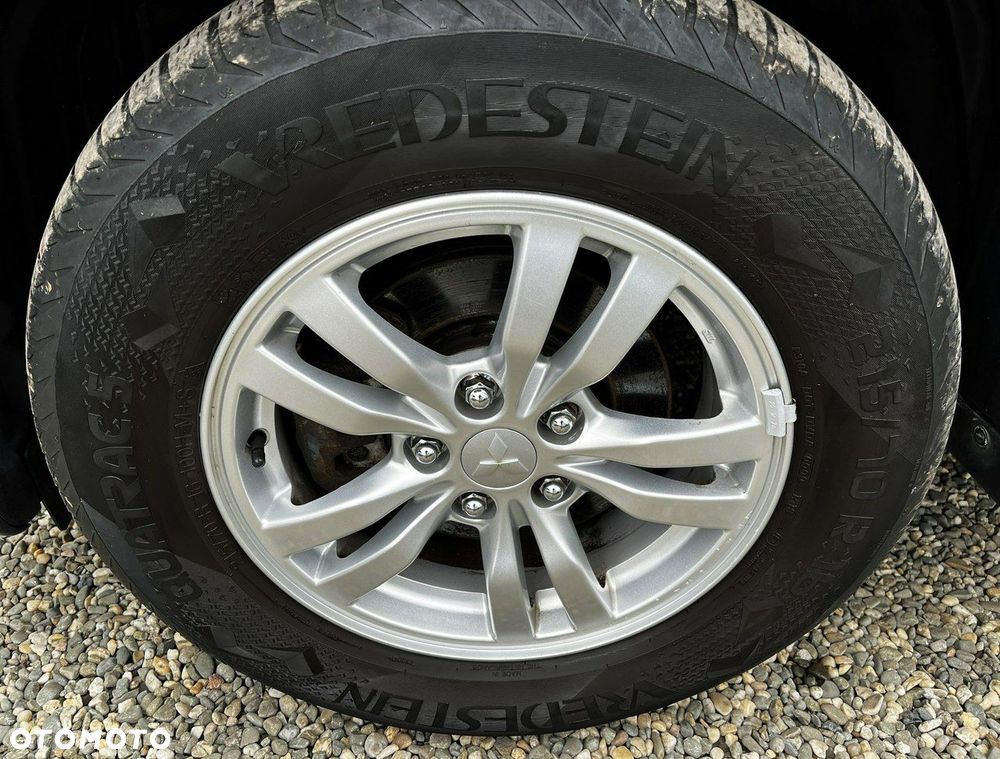 Mitsubishi Outlander 2.0 Instyle + 4WD CVT - 35