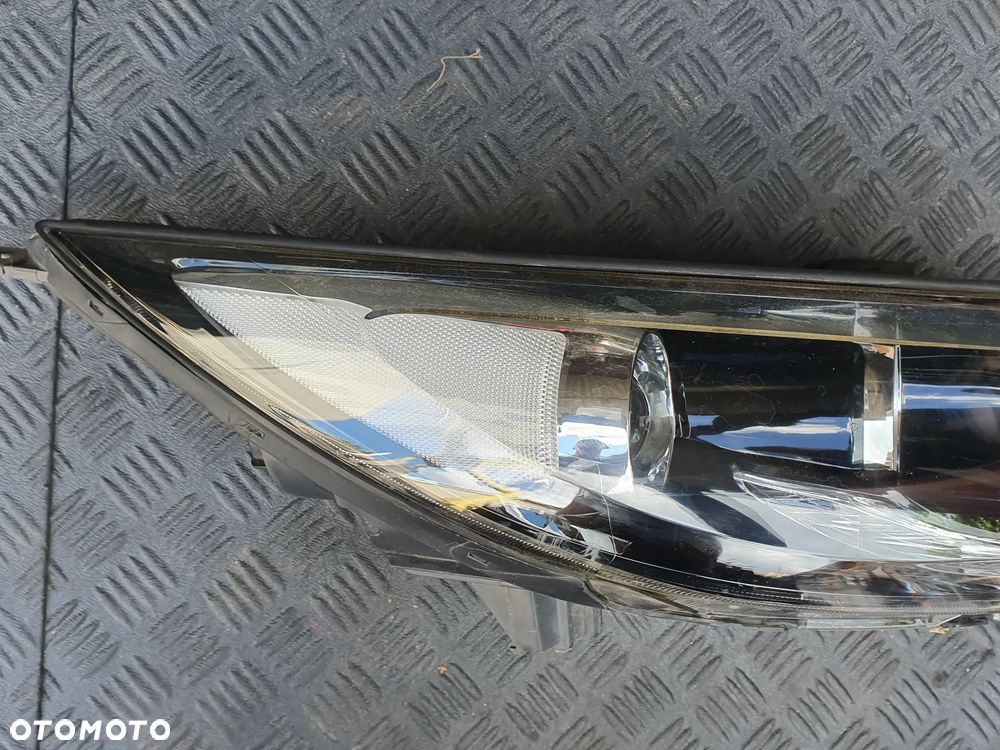 Lampa przednia prawa prawy przód Kia Sportage III 3 soczewka led cała  HOMOLOGACJA E13 - 2