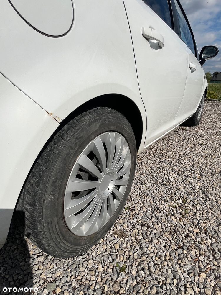 Opel Corsa 1.4 16V Enjoy - 23