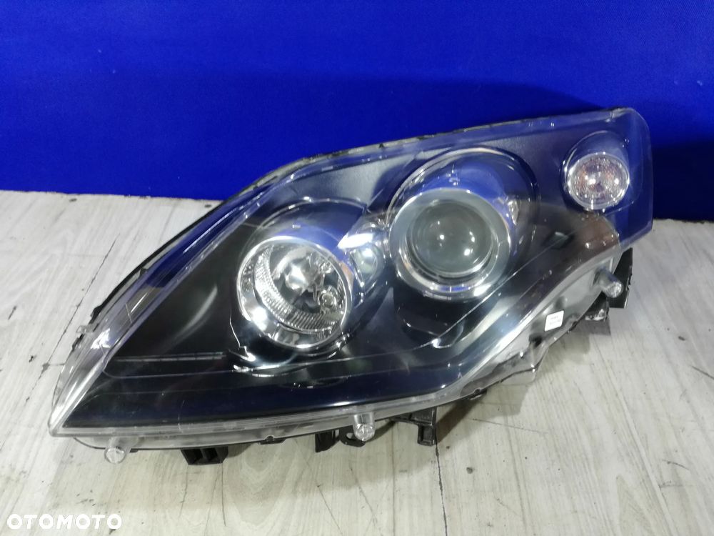 Renault Laguna III 3 07/10 lampa reflektor przód lewa Anglik - 1