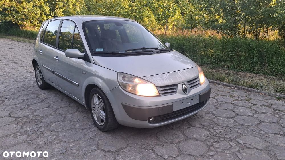 Na części Renault Scenic II silnik 1.6 16v K4M782 lakier MV632 skrzynia maska zderzak drzwi klapa szyba fotel kanapa lusterko lampa deska GWARANCJA !!! Przód Tył Zestaw Komplet Drzwi Klapa Zderzak Błotnik Maska Grill Atrapa Szyba Pas Lampa Lusterko Boczki Fotel Kanapa Kokpit Deska Rozdzielcza Przełącznik Włącznik Sterownik Przewody Wiązka Instalacja Moduł Komputer Czujnik Listwa Pompa Alternator Wtryski Głowica Rozrusznik Kompresor Sprzęgło Dwumas Silnik  Skrzynia ABS Klimatyzacji Paliwa Wspomagania Kolektor Turbina Przepustnica Zawór Chłodnica Koło Hak Belka Sanki Zawieszenie Mcpherson Półoś Amortyzator Wydech Tłumik Zacisk - 2