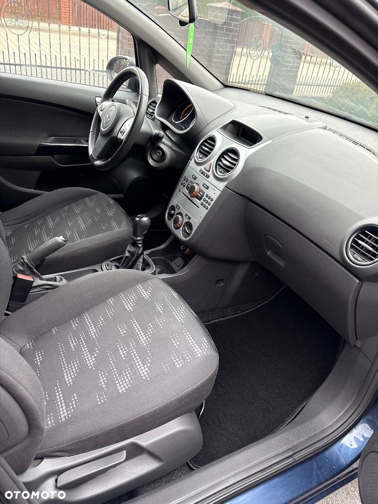 Opel Corsa 1.4 16V Active - 23