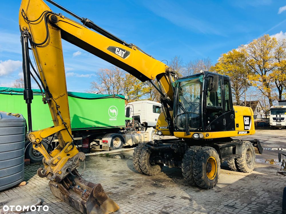 Caterpillar M313D - 1