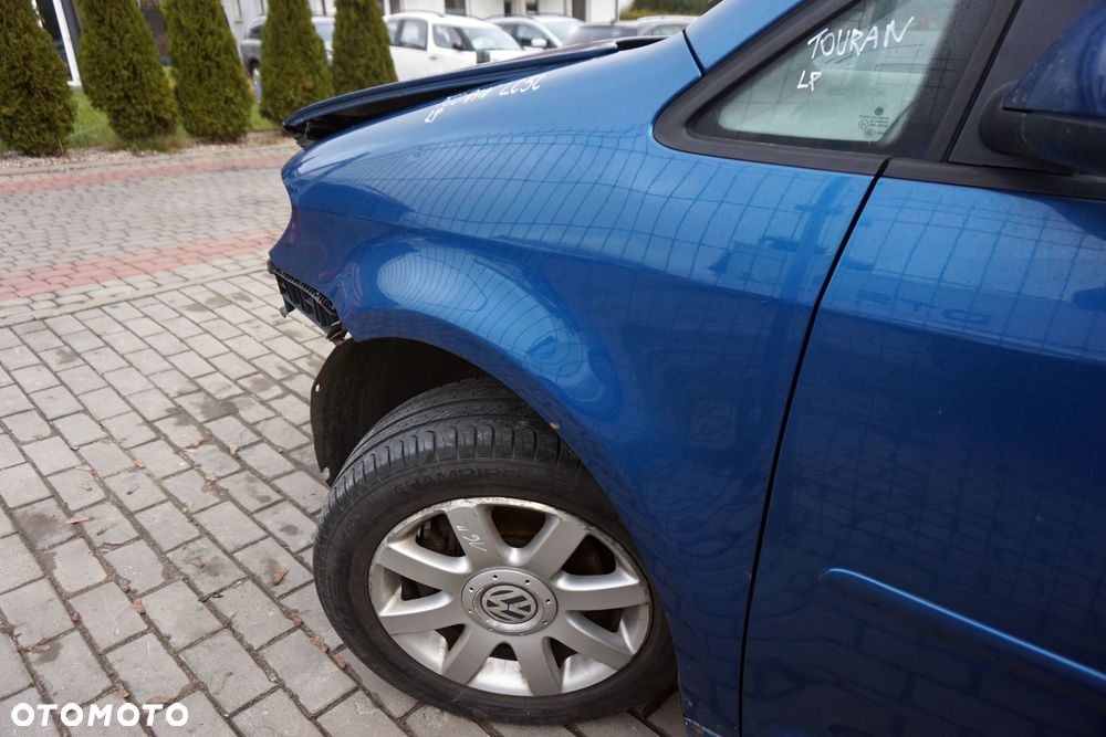 BŁOTNIK PRZEDNI LEWY TOURAN I LIFT FL1 LC5C 1T0821021B NIEBIESKI VOLKSWAGEN 2006-2010 - 2
