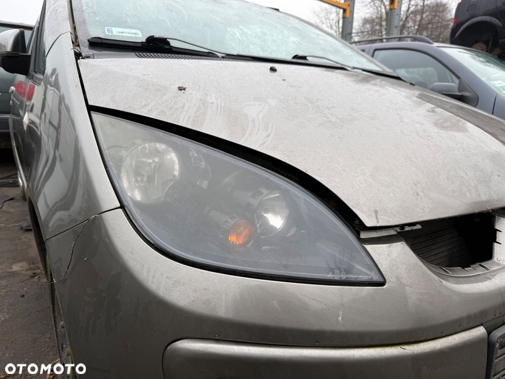 KOMPLET LAMPY PRZEDNIE MITSUBISHI COLT VI 3D - 1