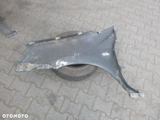 BŁOTNIK PRAWY PRZÓD PRAWY PRZEDNI NISSAN ALMERA TINO - 11