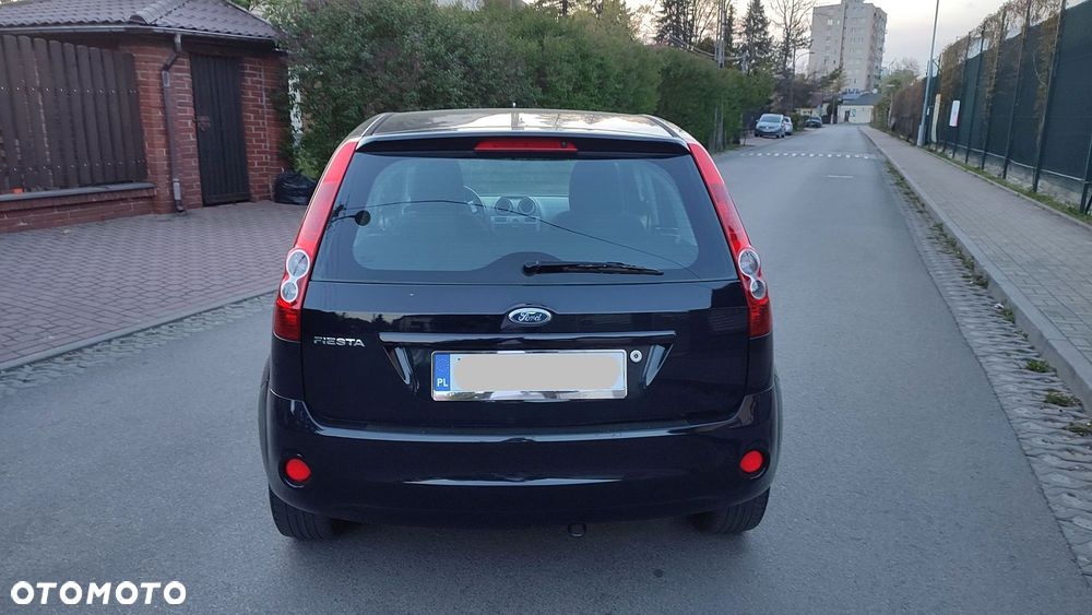 Ford Fiesta 1.4 Ghia - 21