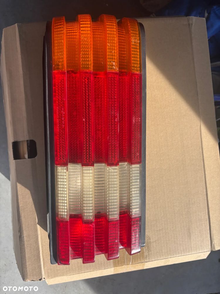 lampa tyl mercedes  560 sec  w126 lewa - 1