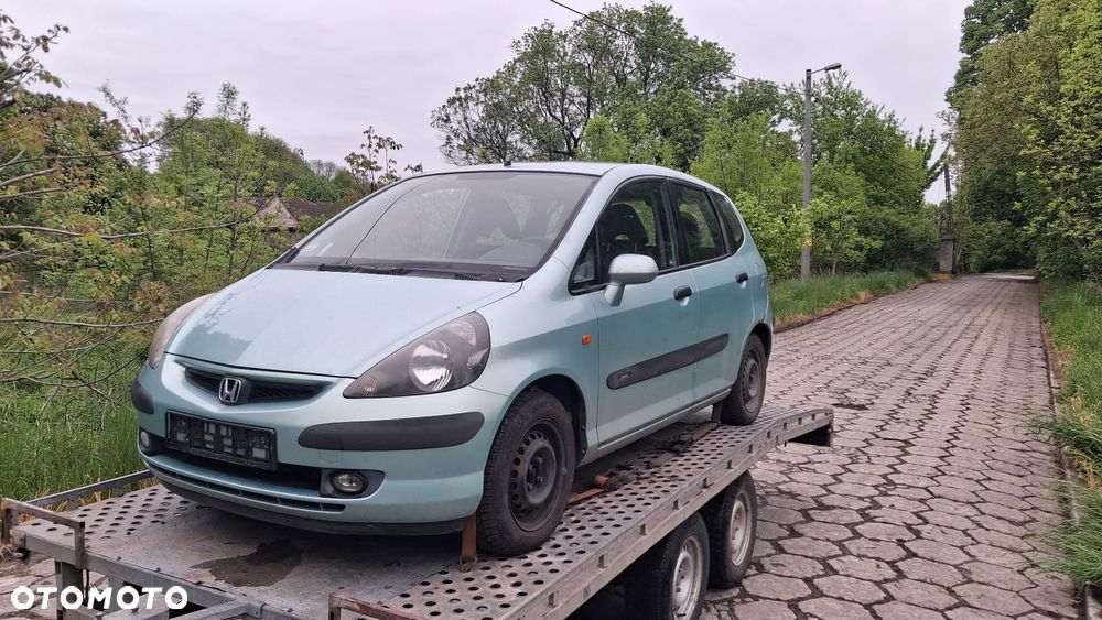 Na części Honda Jazz II Silnik 1.3 83KM L13A1 lakier G506M skrzynia automatyczna CVT maska zderzak drzwi klapa szyba fotel kanapa lusterko lampa deska GWARANCJA !!! Przód Tył Zestaw Komplet Drzwi Klapa Zderzak Błotnik Maska Grill Atrapa Szyba Pas Lampa Lusterko Boczki Fotel Kanapa Kokpit Deska Rozdzielcza Przełącznik Włącznik Sterownik Przewody Wiązka Instalacja Moduł Komputer Czujnik Listwa Pompa Alternator Wtryski Głowica Rozrusznik Kompresor Sprzęgło Dwumas Silnik Skrzynia ABS Klimatyzacji Paliwa Wspomagania Kolektor Turbina Przepustnica Zawór Chłodnica Koło Hak Belka Sanki Zawieszenie Mcpherson Półoś Amortyzator Wydech Tłumik Zacisk - 1