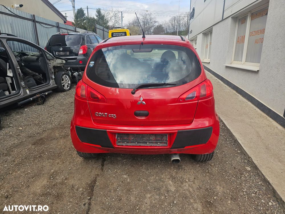 Dezmembrez Mitsubishi Colt CZ3 1.1 benzina an 2006 volan stanga - 7