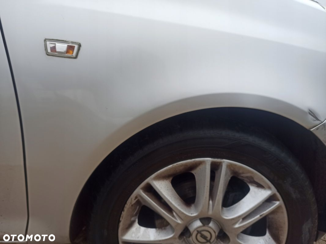 Błotnik prawy przód OPEL CORSA D Z157 06-11 - 6