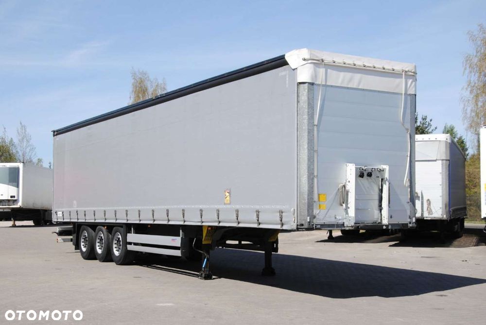 Schmitz Cargobull SCS kurtyna, podnoszona oś - 2