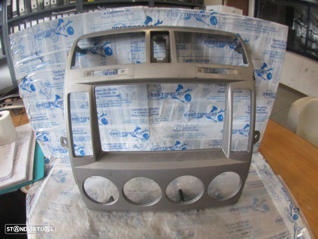 Grelha Friso 0K53B55310 KIA CARNIVAL 2005 2.9CRDI  16V 145Cv 5P AZUL MEIO PAINEL CENTRAL - 1