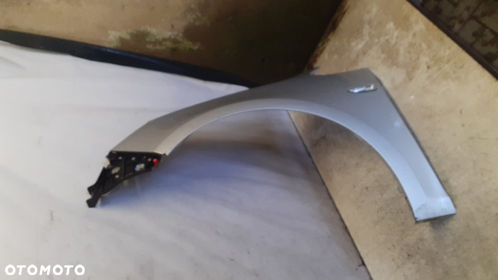 * BŁOTNIK LEWY OPEL ASTRA J IV LIFT  Z176 SREBRNY do malowania !!! - 3