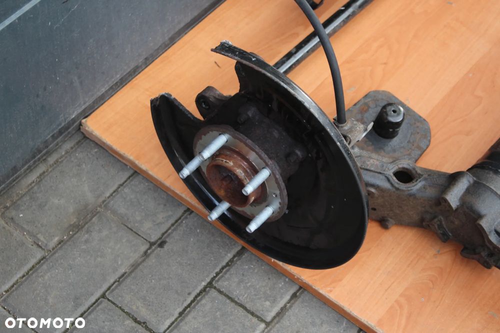 BELKA ZAWIESZENIA TYŁ TYLNA OPEL ZAFIRA C DIESEL 5X115 KOMPLETNA Z PIASTAMI - 8