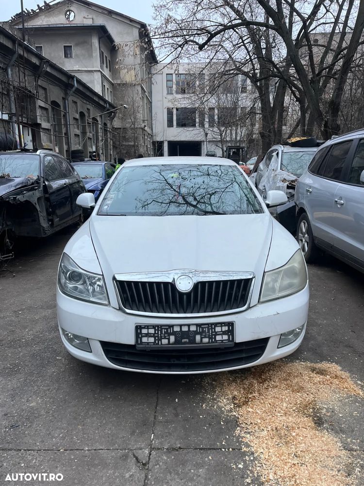 Far stanga cu lupa si halogen Skoda Octavia 2 facelift 2012 - 1