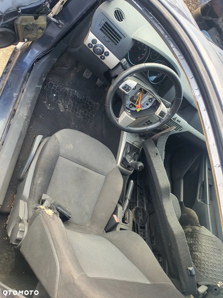opel astra h gtc fotel kanapa deska kokpit podsufitka boczek podłokietnik licznik panel - 2