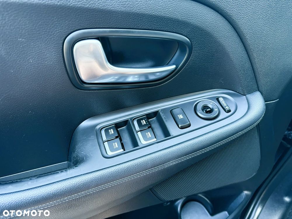Kia Carens - 12