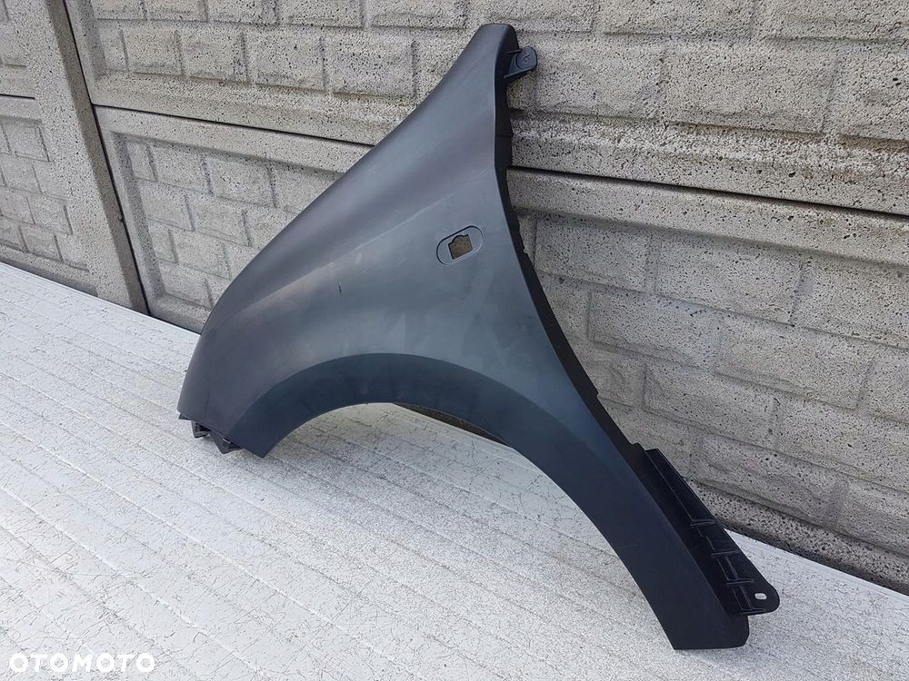 BŁOTNIK LEWY RENAULT TWINGO 3 III 2014 - 2018 - 2