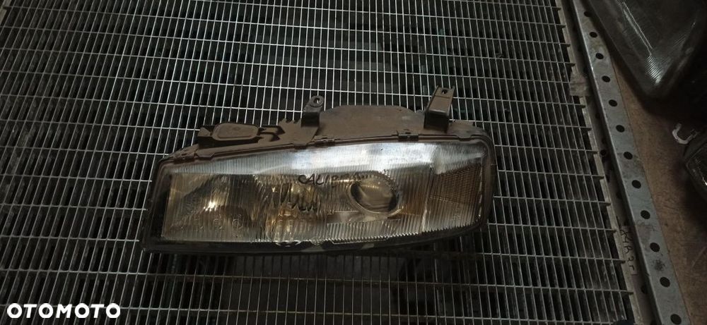 Opel calibra reflektor lampa przednie lewa 2 soczewki odblaski lekko podpalony wszystkie zaczepu ok gwarancja - 1