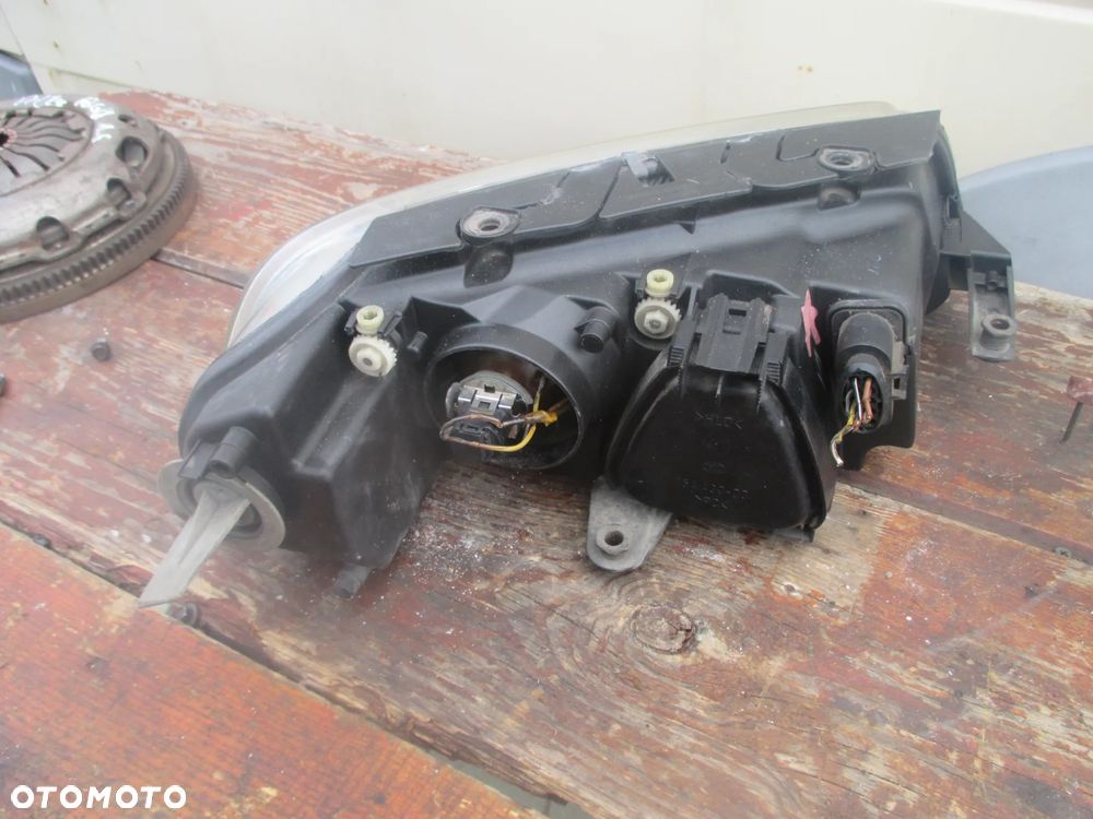 lampa lewa VW Passat B5 LIFT Hella Europa - 4