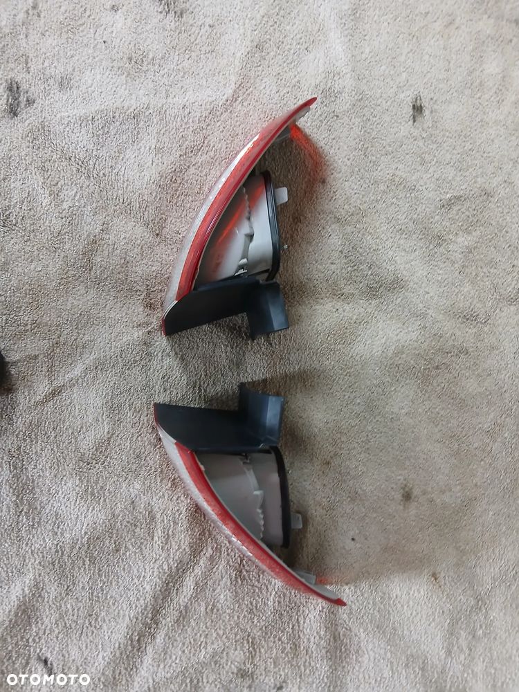 LAMPA TYLNA LEWA FORD MONDEO MK 4 HB. - 4