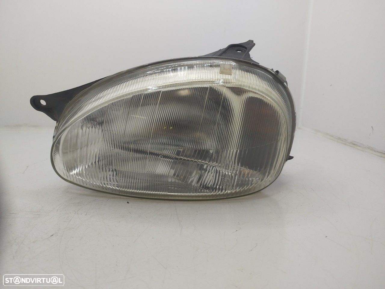 Farol/ Otica Dianteiro Esq Opel Corsa B (S93) - 1