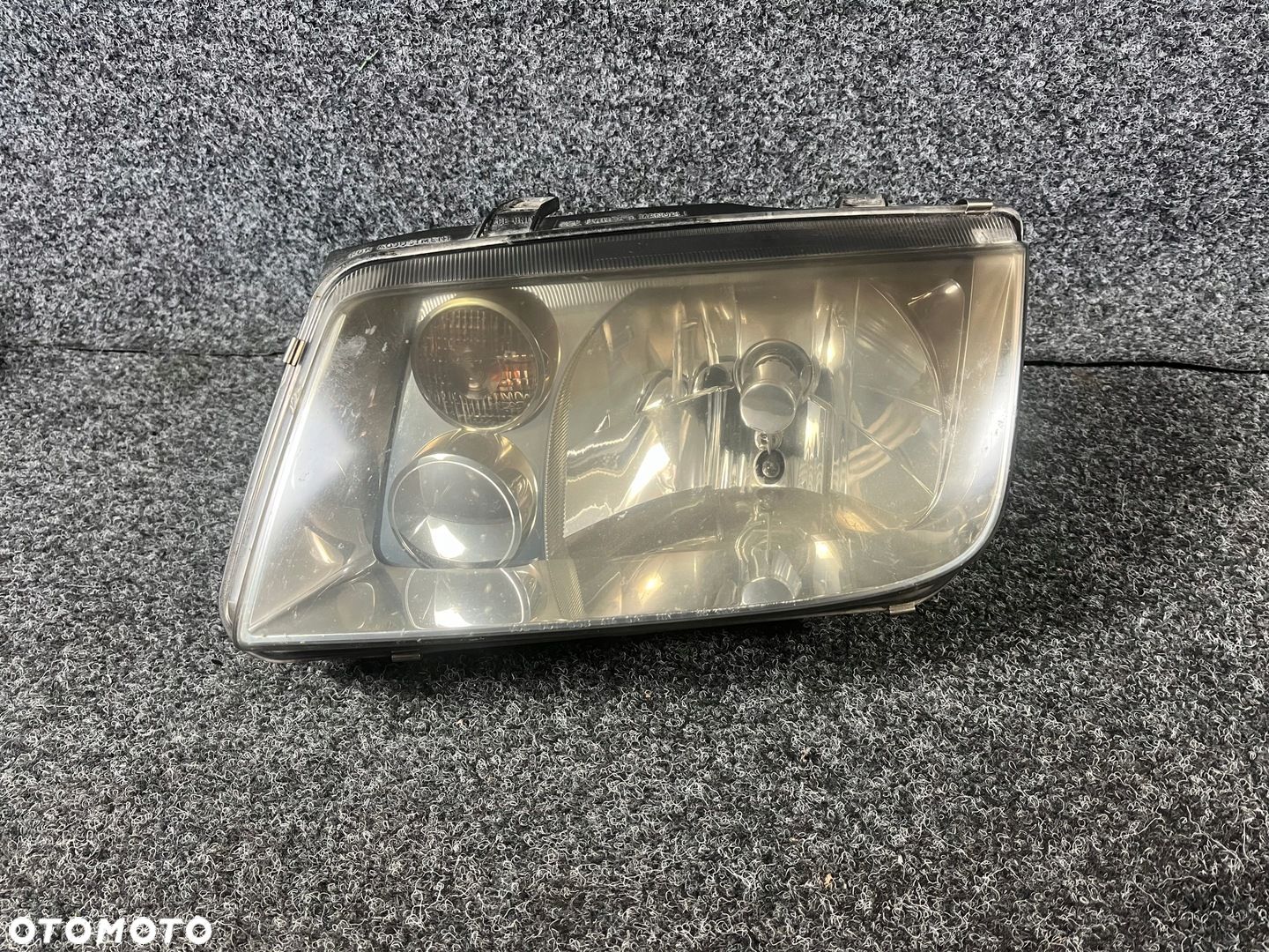 vw bora lampa lewy przód hella europa - 1