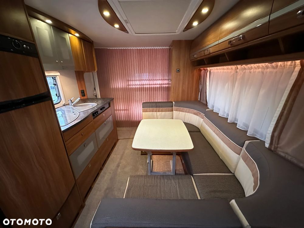 Dethleffs 550 NOMAD z przedsionkiem Isabella i łóżkami piętrowymi. - 21