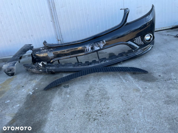 MERCEDES CL 216 zderzak AMG halogen zaślepka xenon  wzmocnienie stelaż