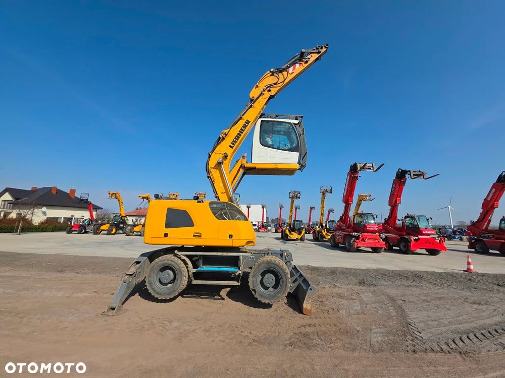 Liebherr A 914 Litronic jak TEREX CAT SENNEBOGEN M497 - 1