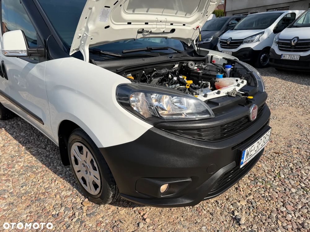 Fiat DOBLO VAN VAT-1 Homologacja cięż. DMC: 2145kg Ładowność 706kg MOCNY SILNIK 1.6 MultiJet, 105KM Emisja Euro-6, Skrzynia biegów 6-cio stopniowa! ORYGINALNA ZABUDOWA PAKI, BOCZNE DRZWI PRZESUWNE, RADIO FABRYCZNE, Hak 1300kg, PODGRZEWANE FOTELE Z REG. I PODŁOKIETNIKIEM, BAGAŻNIK DACHOWY ORYGINALNY FIAT, PARKTRONIKI, ALARM.. - 35