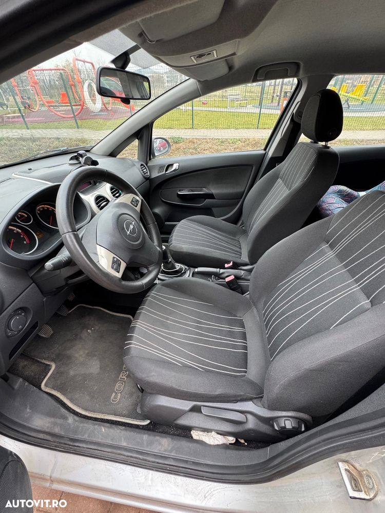 Opel Corsa 1.4 16V Enjoy - 6