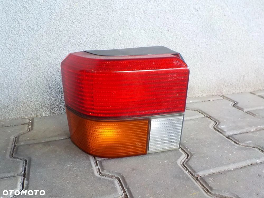 VW T4 MULTIVAN LAMPA TYŁ TYLNA ORYGINAŁ VW ŁADNA LEWA - 1