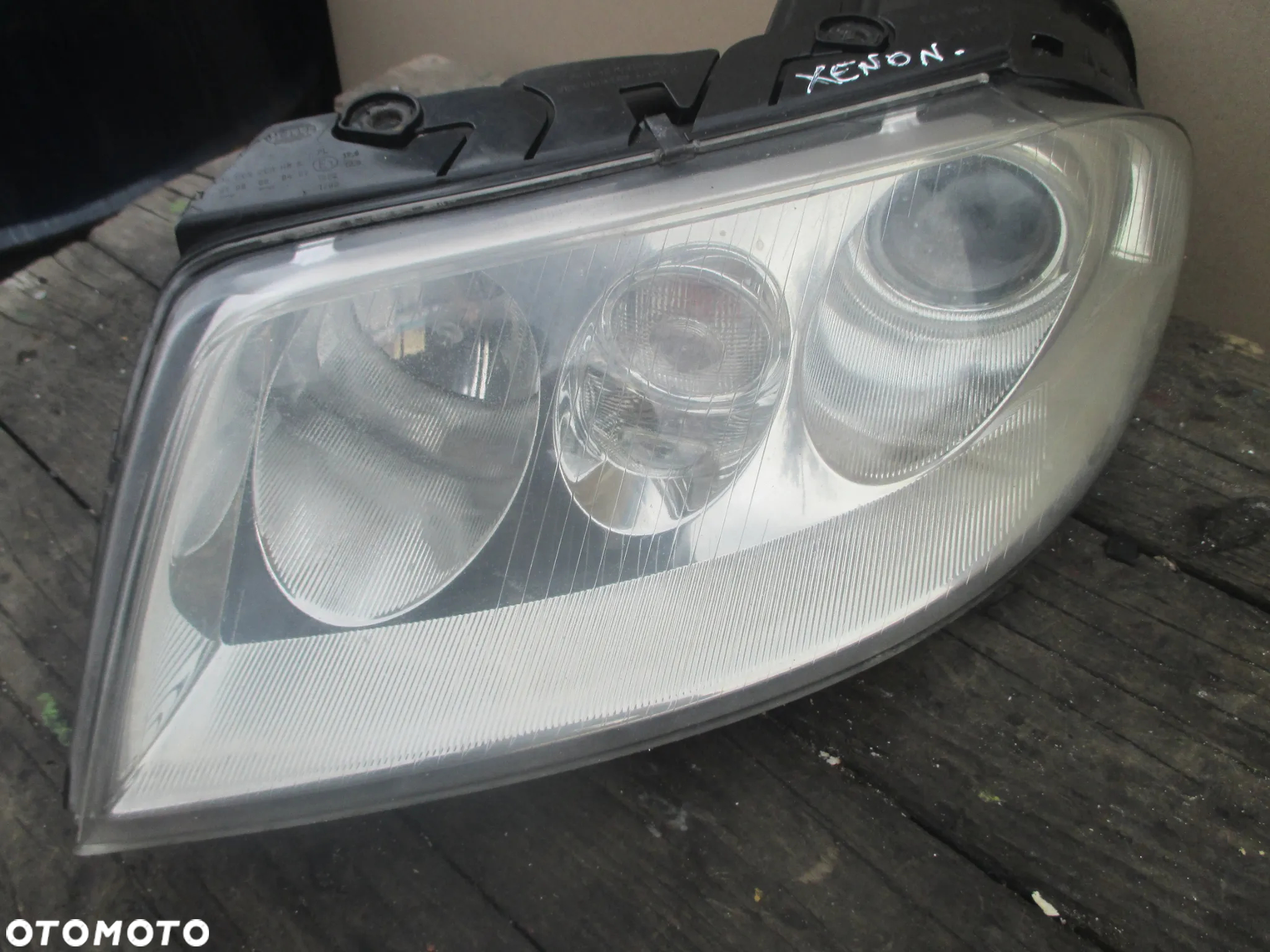 lampa lewa VW Passat B5 lift Xenon Hella Europa - 7