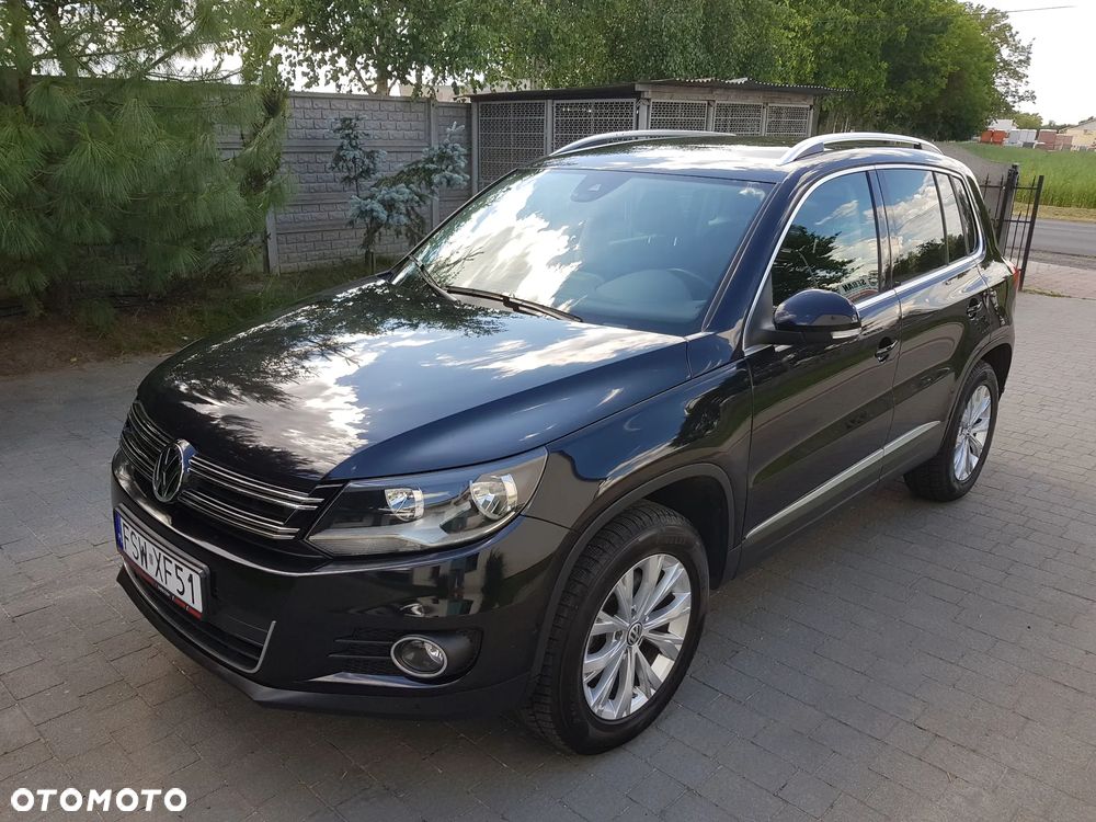 Volkswagen Tiguan 1.4 TSI 4Motion Exclusive - 1