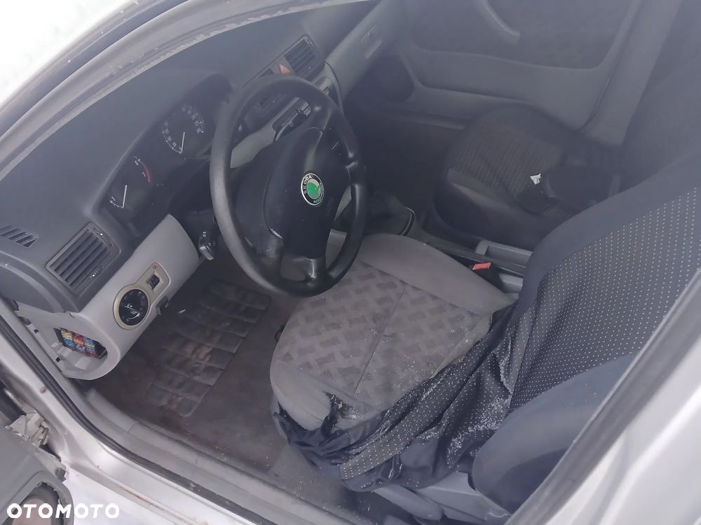 skoda octavia I fotel kanapa deska kokpit podsufitka boczek podłokietnik licznik panel - 2