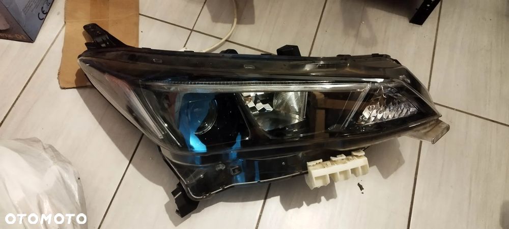 prawy błotnik lampa gril nissan leaf - 6