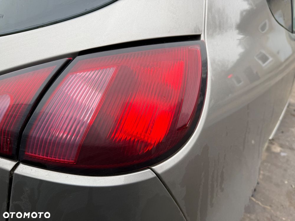 LAMPA TYLNA PRAWA LEWA W BŁOTNIK MITSUBISHI COLT VI 3D -WYSYŁKA- - 2