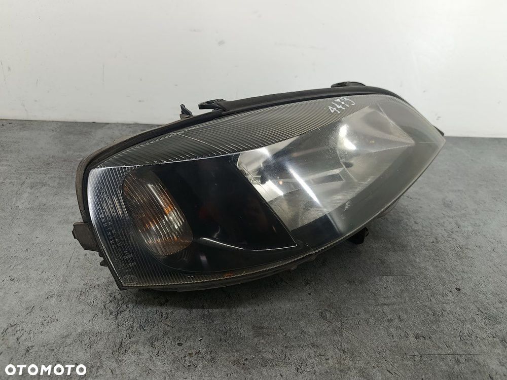 LAMPA PRZÓD PRAWA OPEL ASTRA G 093175724  1EG007640-58 - 2