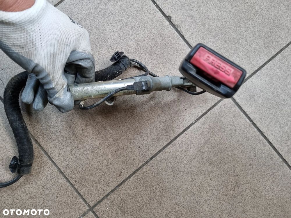 NAPINACZ PASA BEZPIECZEŃSTWA KIEROWCY LEWY TRAFIC VIVARO PRIMASTAR 01-14r. - 2